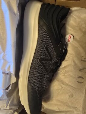New Balance Men's Athletic Sneaker in Black and Cream